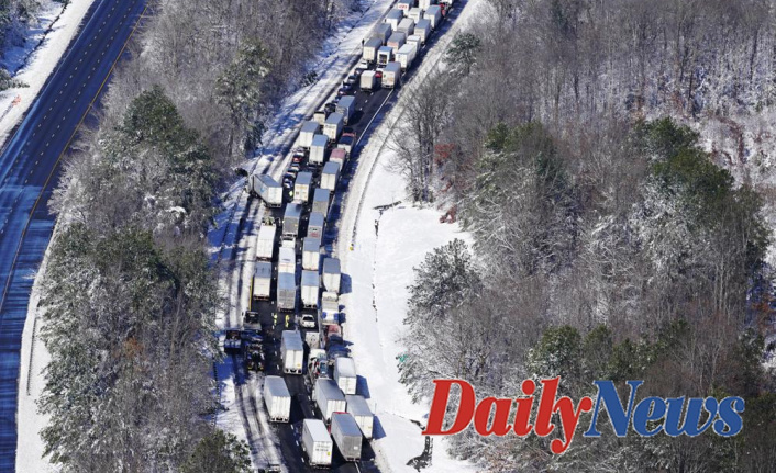 Virginia's response in the face of snowy I-95 gridlock is criticized in a report
