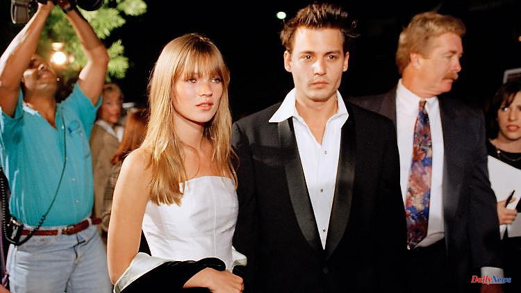 At a concert in London: Kate Moss celebrates with Johnny Depp