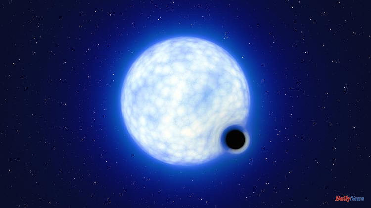 Discovered in neighboring galaxy: black hole astonishes twice