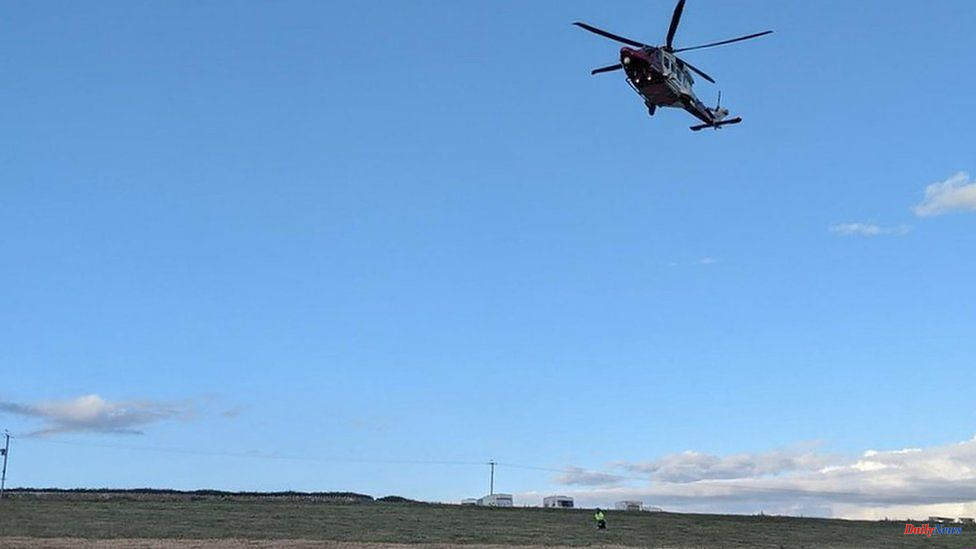 Nash Point: Cliff helicopter rescues family members who have been cut off by the tide