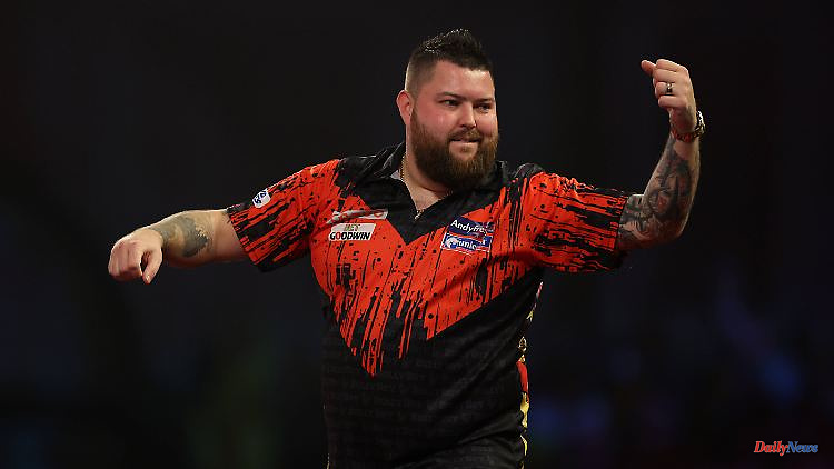 Epic nine-darter finale: Furious Smith crowned darts world champion