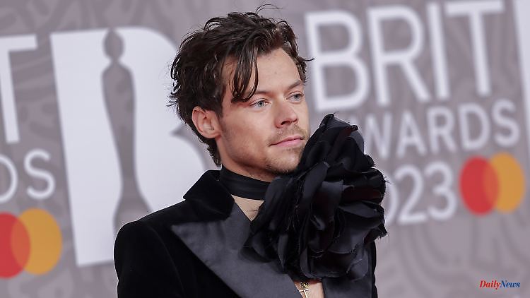 Quadruple triumph: Harry Styles skims at the Brit Awards