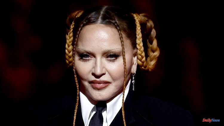 "Look how cute I am": Madonna counters critics with humor