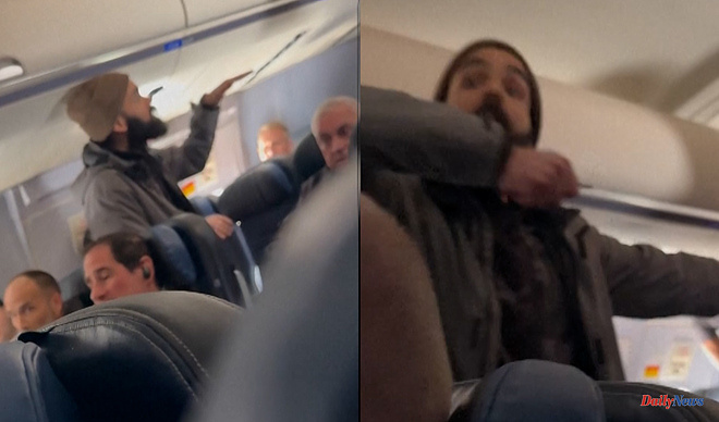 USA A man tries to open an emergency exit in mid-flight and stab a flight attendant