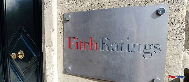 France pledges to continue reforms after Fitch downgrades