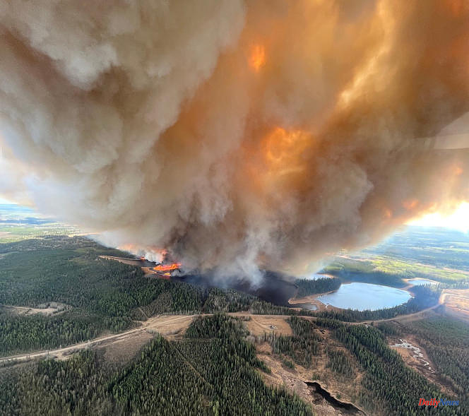 Western Canada hit by floods and first forest fires