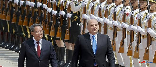 Russian Prime Minister denounces Western "pressure" in Beijing