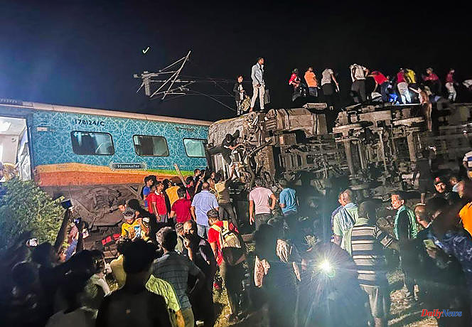 In India, a collision of three trains leaves more than 200 dead and nearly 850 injured