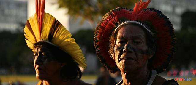 Indigenous people demonstrate in Brasilia, on the eve of a crucial trial for their lands