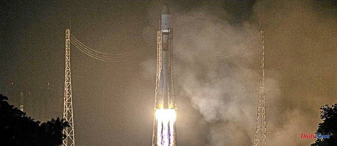 A Soyuz rocket arrives on the ISS with two Russians and an American on board