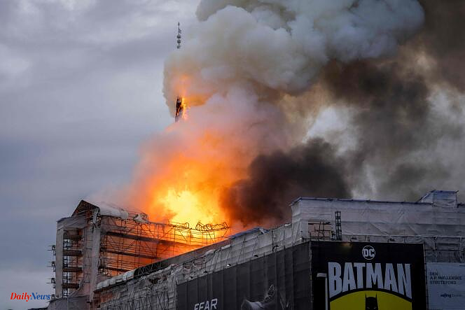 The former Copenhagen Stock Exchange, a historic 17th-century building, is on fire