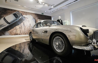 Aston Martin brings in millions: James Bond car auction moves to tears