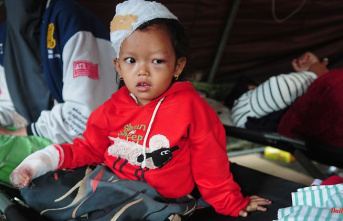 Dozens of children dead after earthquake leaves trail of devastation in Indonesia