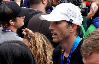 Not a bad time at all!: Ashton Kutcher runs the New York marathon