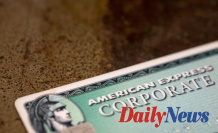 American Express profits drop slightly but spending increases
