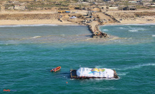 A first humanitarian aid boat unloaded its cargo in Gaza