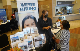 The US unemployment rate drops to 3.9%, as more people are able to find work