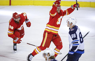 Flames beat Jets to extend their winning streak to...