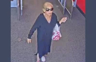 Police call an elderly woman "the hugging bandit"...