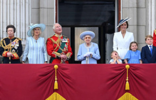 Elizabeth II and members of the royal family cheered...