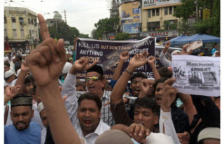 India. Two Indian police officers are killed in protests...