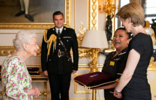 Queen presents the George Cross and NHS medals to...