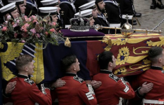 Family funeral: The Queen's coffin has arrived...