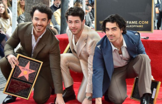 Honored on Walk of Fame: The Jonas Brothers unveil...