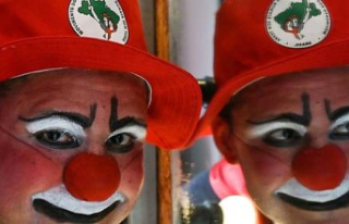 In Brazil, a psychiatrist clown at the bedside of...