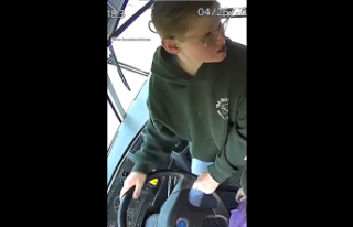 USA A 13-year-old boy brakes a school bus after the...