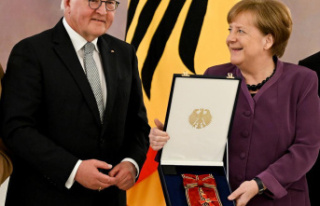 Europe Merkel receives Germany's highest decoration...