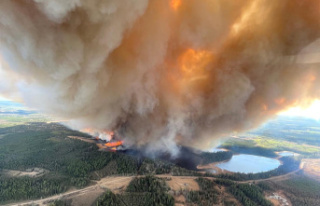 Western Canada hit by floods and first forest fires
