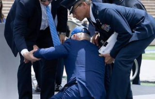 Biden falls on stage during a military ceremony