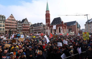 In Germany, more than 100,000 people demonstrate against...