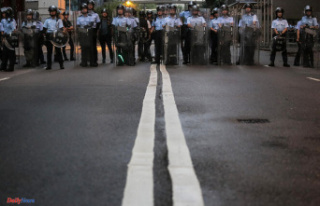 In Hong Kong, twelve people incarcerated for storming...