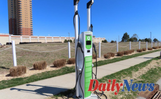 Electric car charging stations are being added to towns as gas prices rise
