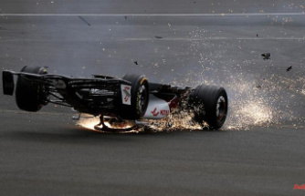 Car lands behind tire wall: F1 race interrupted after violent head-first descent