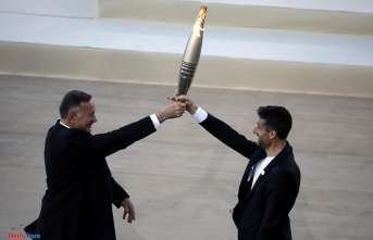 2024 Olympic Games: the Olympic flame handed over by Greece to the French organizers, Florent Manaudou first bearer