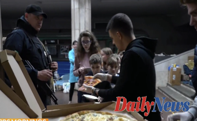In the midst of violence and war, a Ukrainian pizza guy delivers "a little bit of happiness"