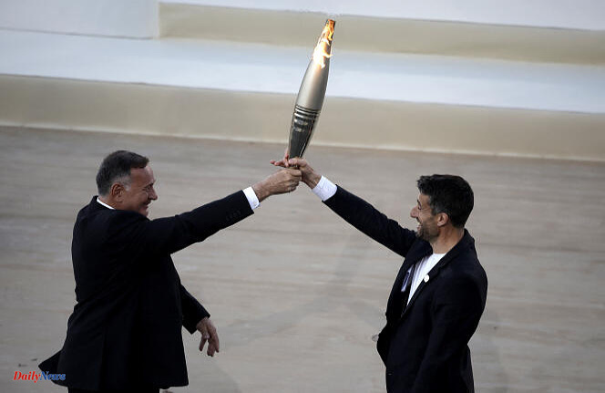 2024 Olympic Games: the Olympic flame handed over by Greece to the French organizers, Florent Manaudou first bearer